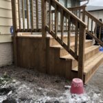 After- very large platform and stairs with wood balusters