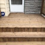 After- very large platform and stairs with wood balusters