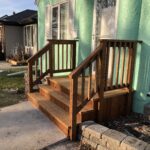 After- Mint house with round details in platform with stairs and railings